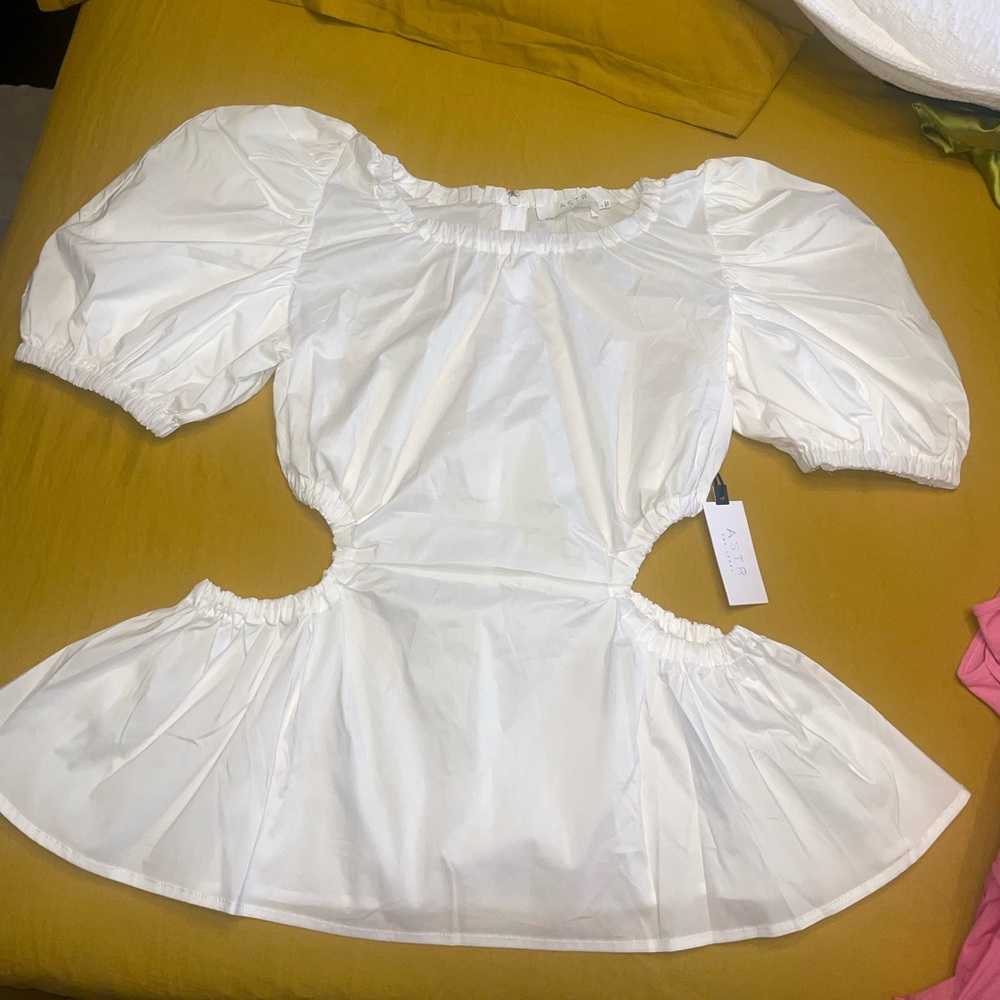 Puff sleeve top with cut out sides